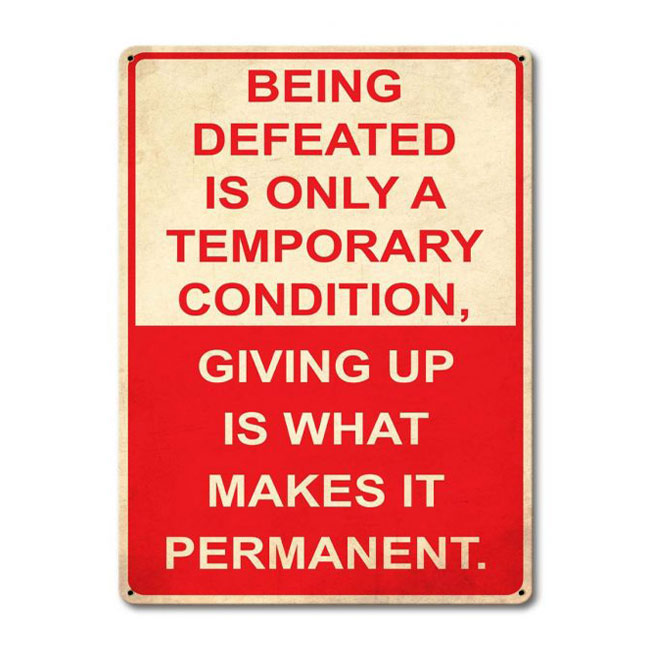 Being Defeated Sign
